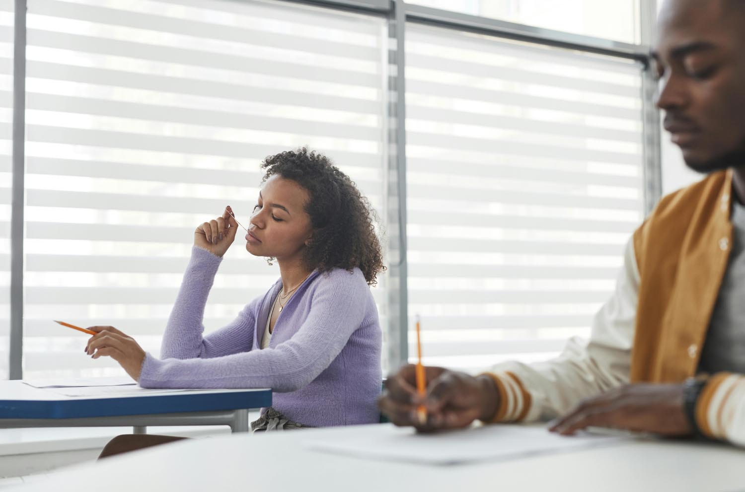 Adult completing cognitive testing during a neuropsychological evaluation.
