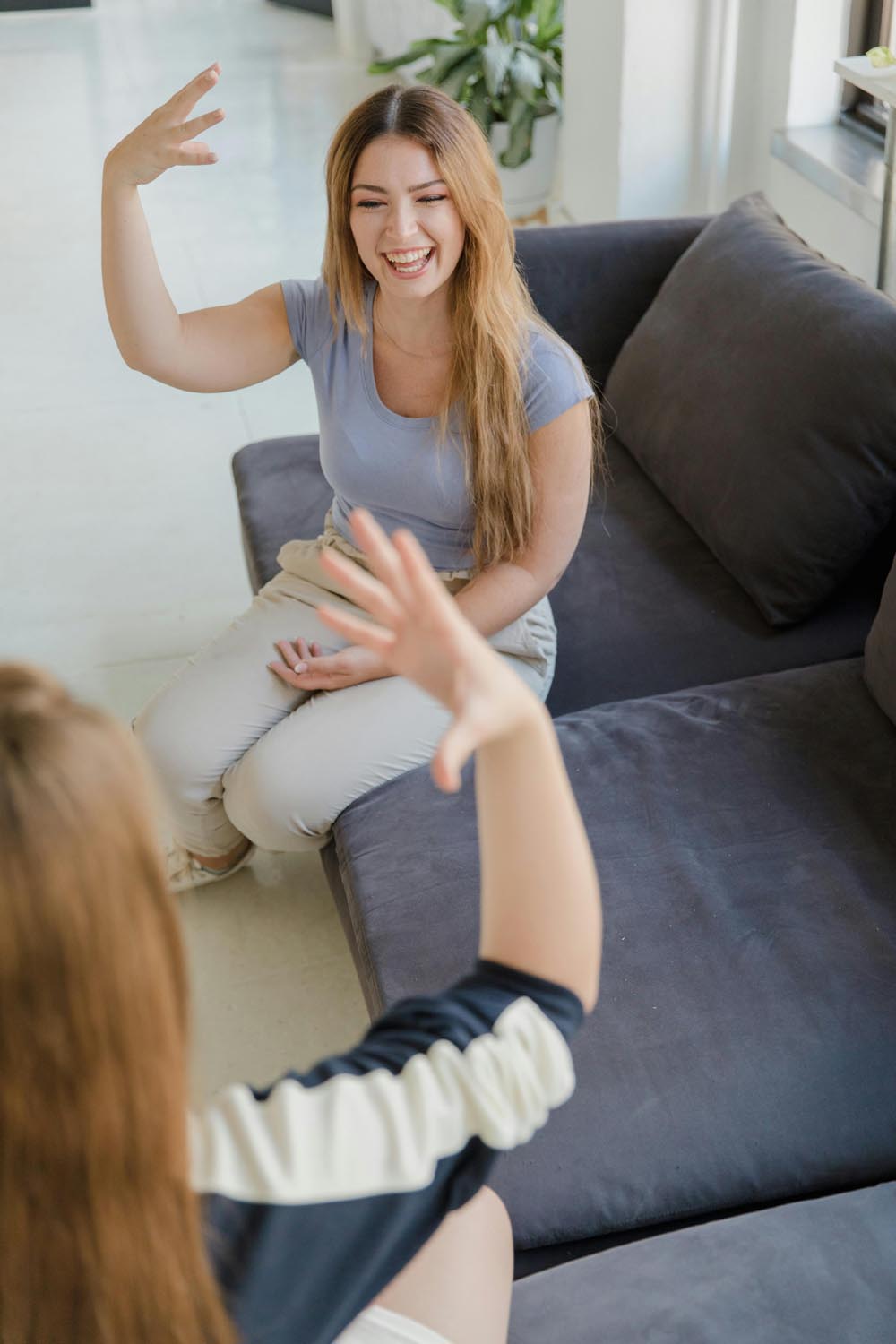 Clinician and client using American Sign Language during an appointment.