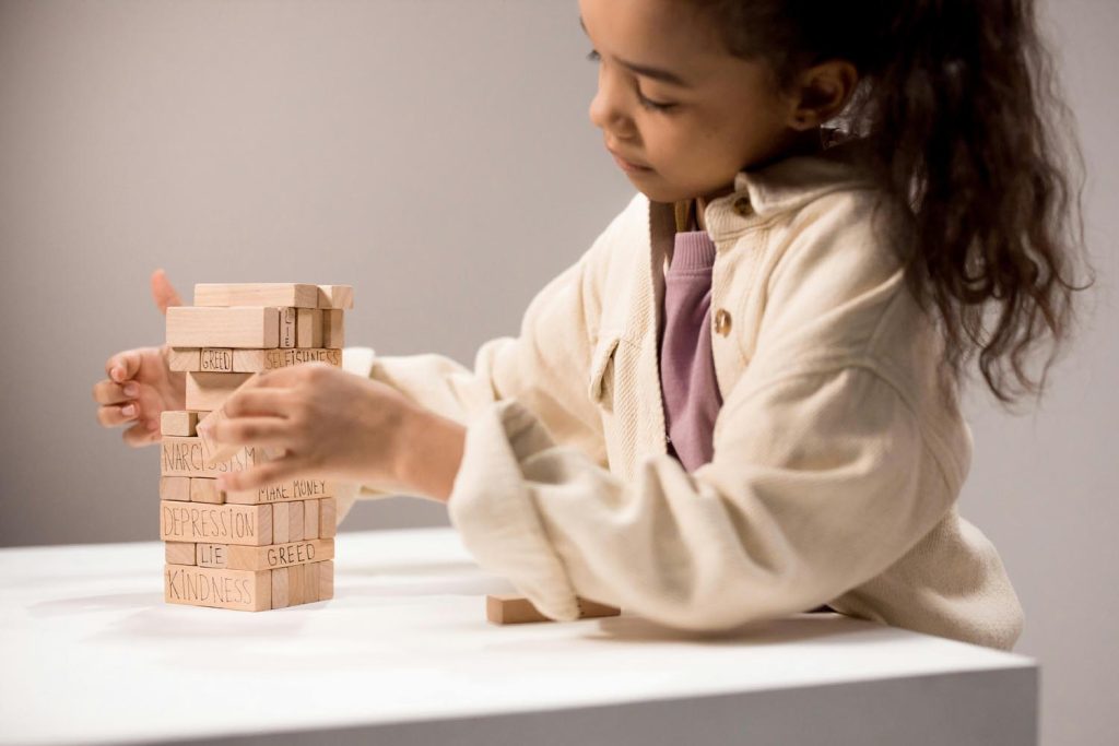 Pediatric neuropsychological testing using wooden blocks.